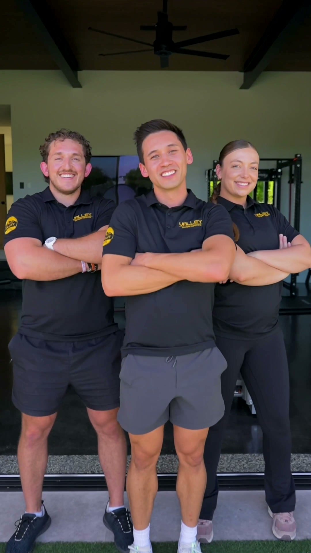Three Valley In-Home Training trainers standing together with arms crossed